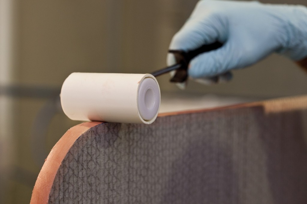 Spray with water and then use a smooth roller to compact and remove excess material © Steve Ryan
